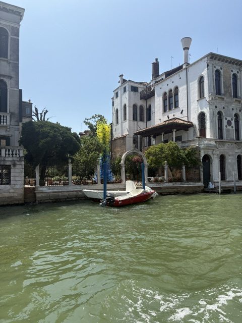 Canalside villa and boat